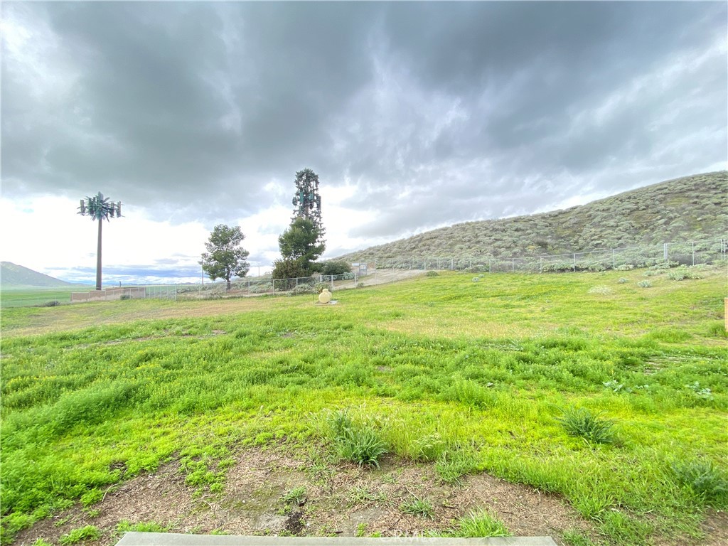 14670 Gilman Springs Road Moreno Valley, CA 92555 - Photo 48 of 50 a view of a lake with a big yard