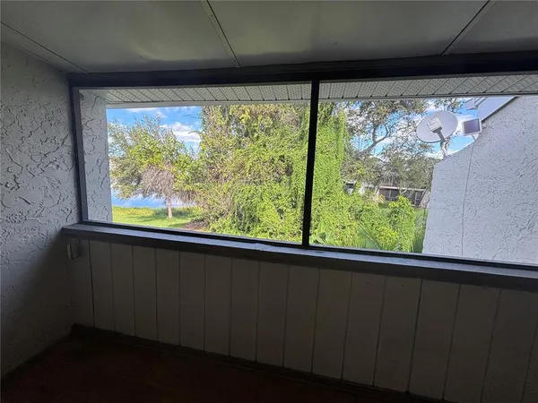 a view of a room with a large window