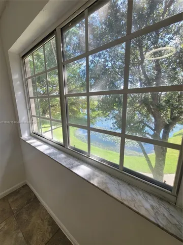 a view of room with a large window