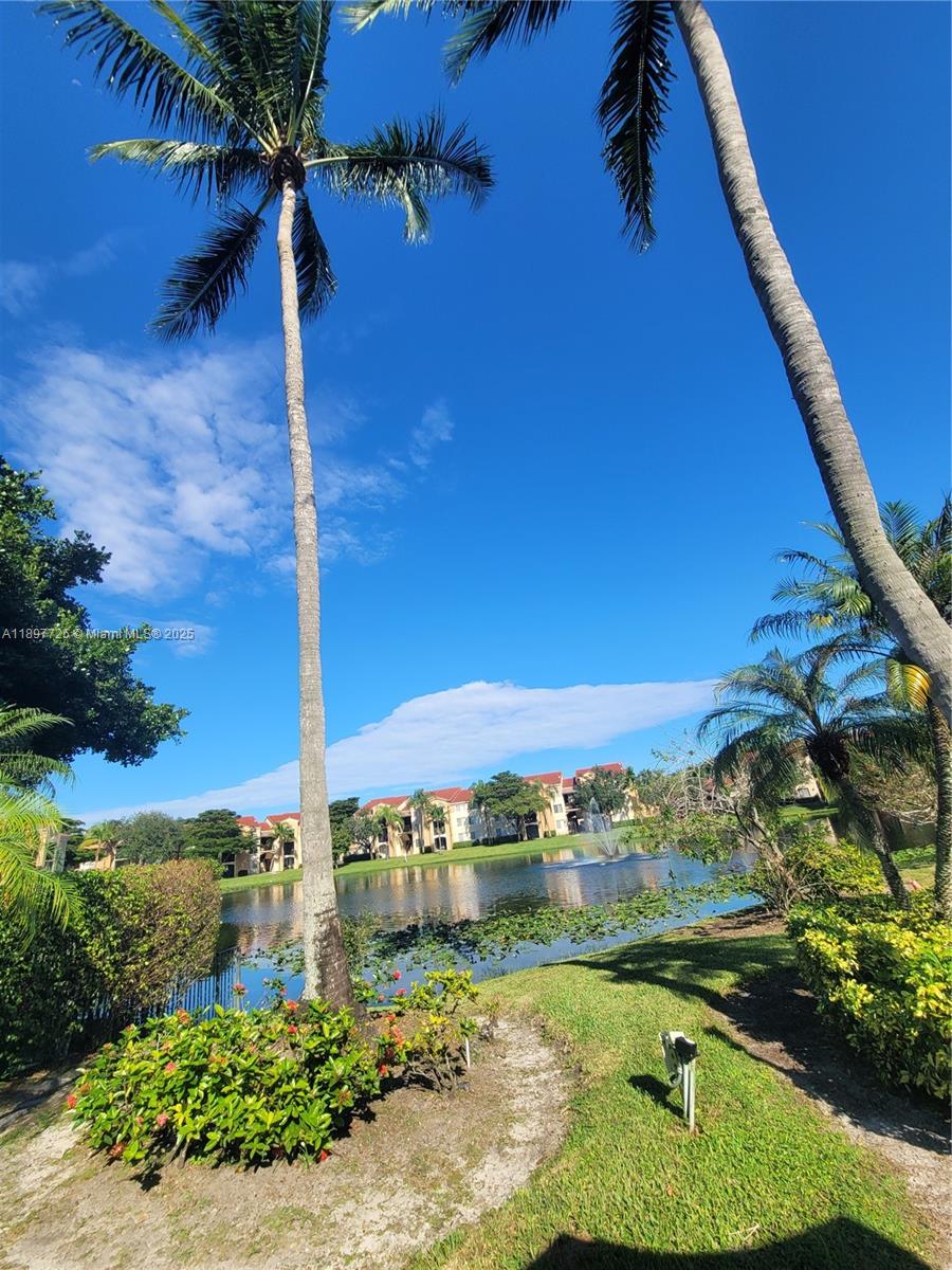 2133 Renaissance Boulevard, Unit 306 Miramar, FL 33025 - Photo 32 of 41 a view of a balcony with an outdoor space