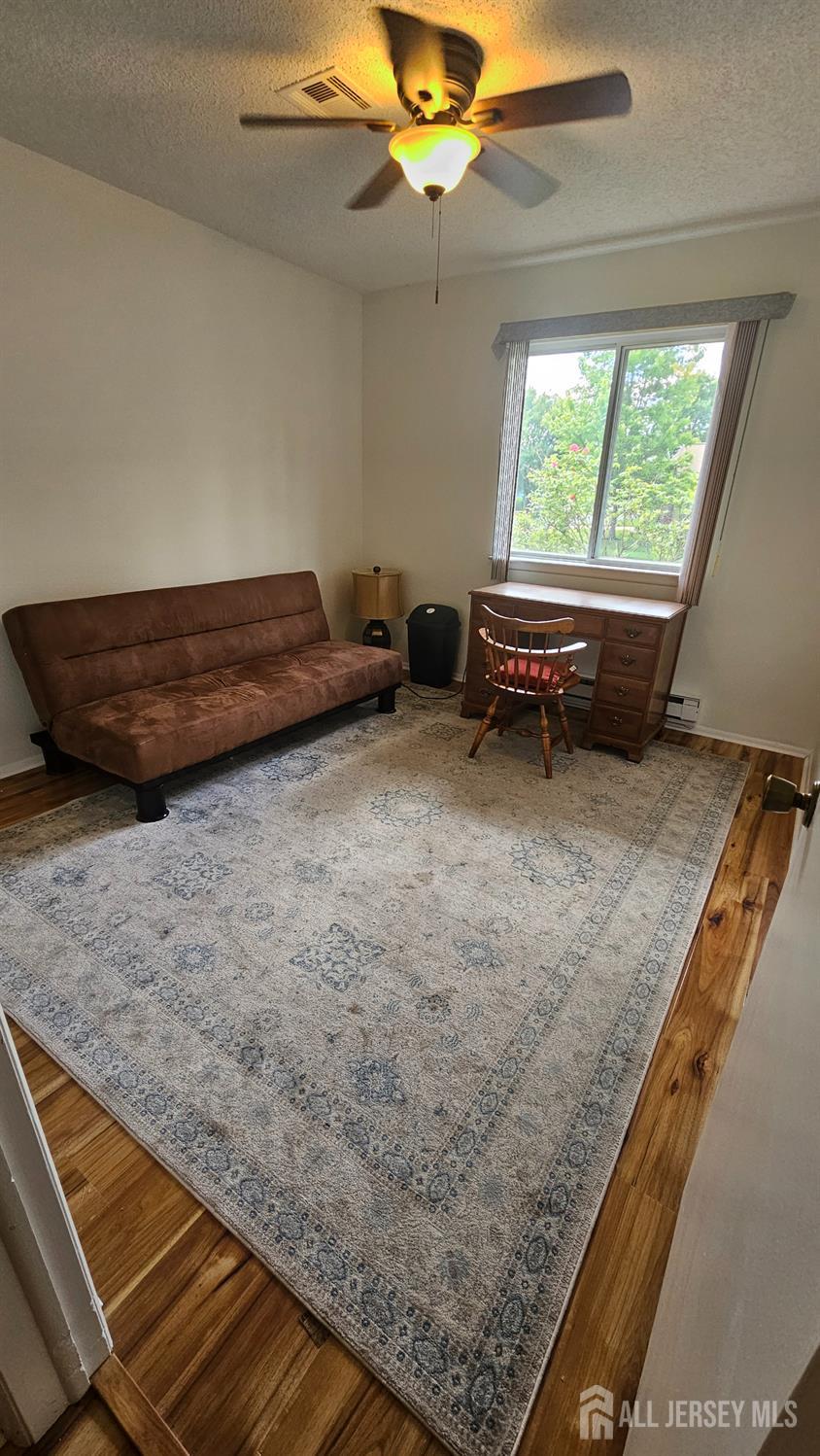 449 B Closter Road, Unit B Monroe Township, NJ 08831 - Photo 11 of 14 a view of a room with a large window and chandelier