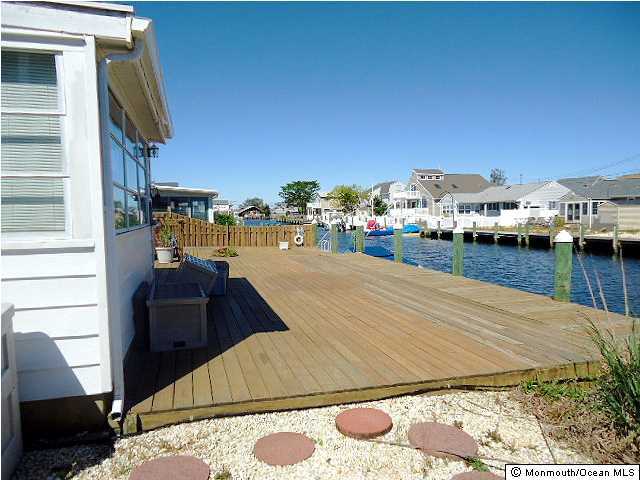 208 Heron Road Lavallette, NJ 08735 - Photo 2 of 11 a view of a terrace with wooden floor