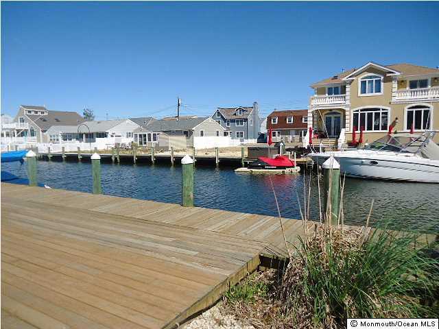 208 Heron Road Lavallette, NJ 08735 - Photo 3 of 11 a view of house with outdoor space and swimming pool