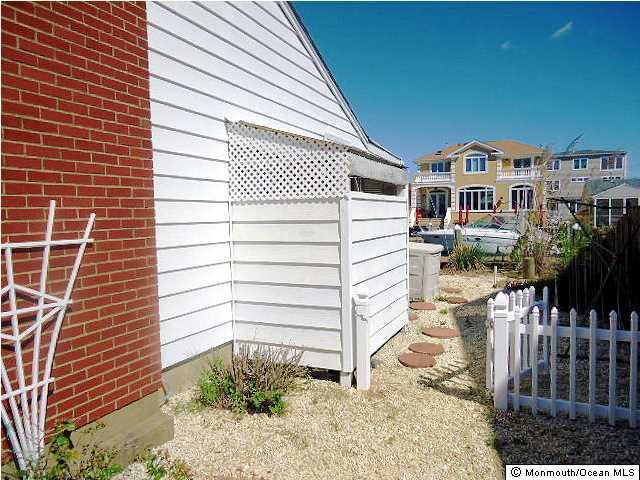 208 Heron Road Lavallette, NJ 08735 - Photo 8 of 11 a view of a house with a yard