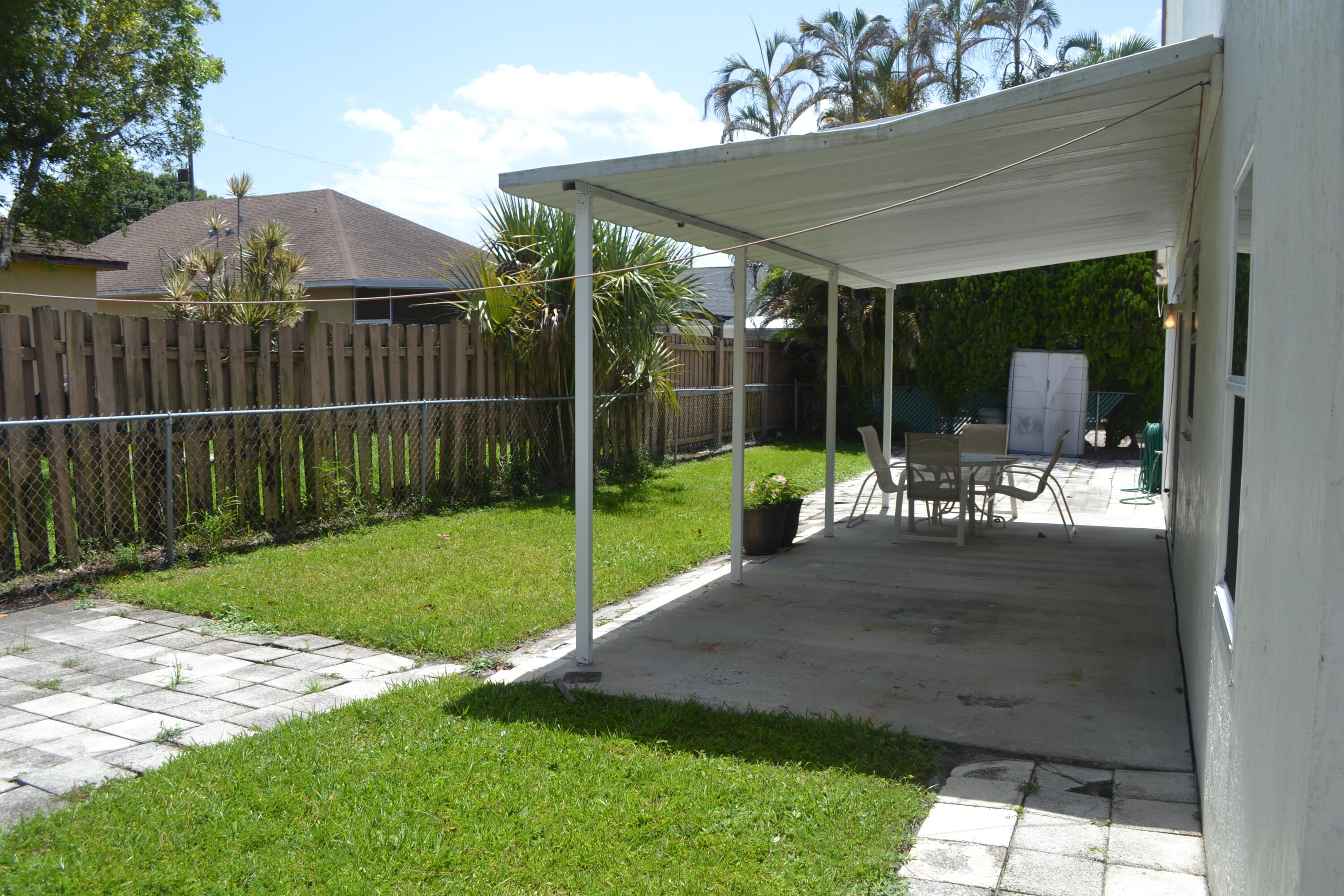6310 Drake Street Jupiter, FL 33458 - Photo 16 of 17 Covered patio