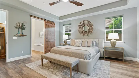 a bedroom with a bed and a closet