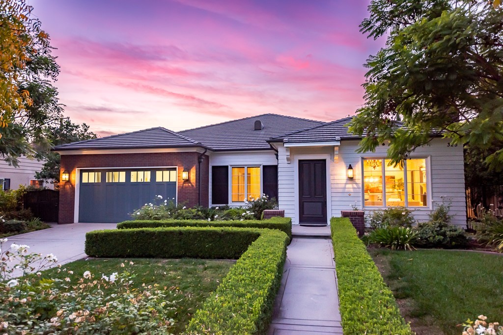 325 South Old Ranch Road Arcadia, CA 91007 - Photo 1 of 1 a front view of a house with a garden and plants
