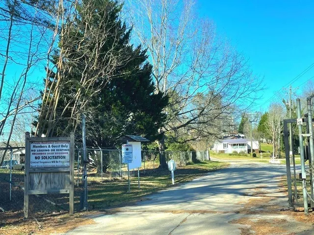 a view of a trees in front of a building