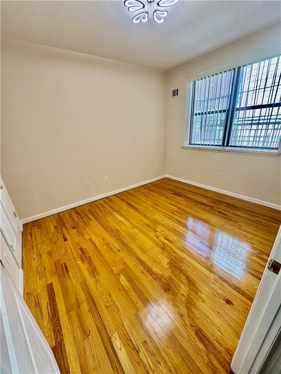 1476 67th Street, Unit 1 Brooklyn, NY 11219 - Photo 3 of 6 a view of an empty room