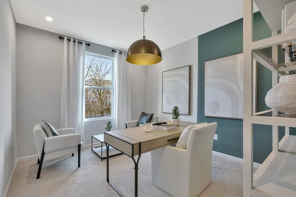 a dining room with furniture and window