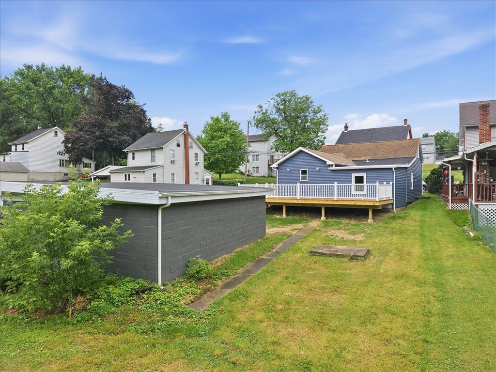 5641 North Coplay Road Whitehall, PA 18052 - Photo 64 of 68 A deep blue exterior with a white deck creates a welcoming backyard.
