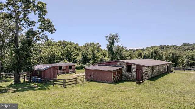 a view of a lake with houses in the back