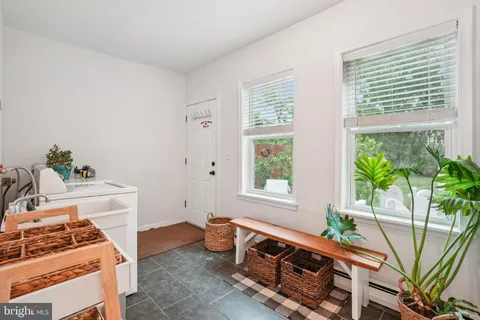 a room with furniture and a window