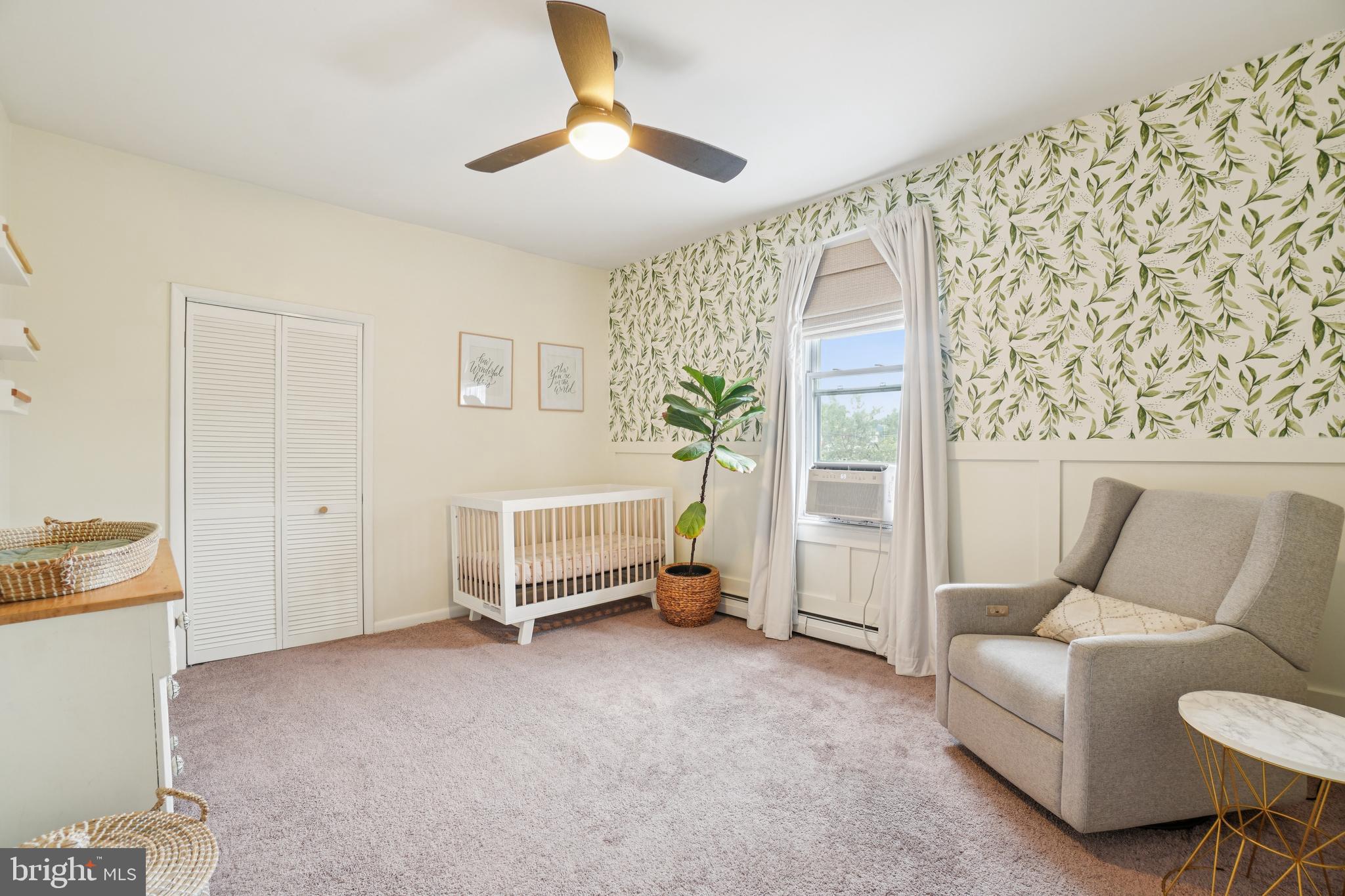 3206 5th Street Southeast Washington, DC 20032 - Photo 18 of 25 a living room with furniture and a window
