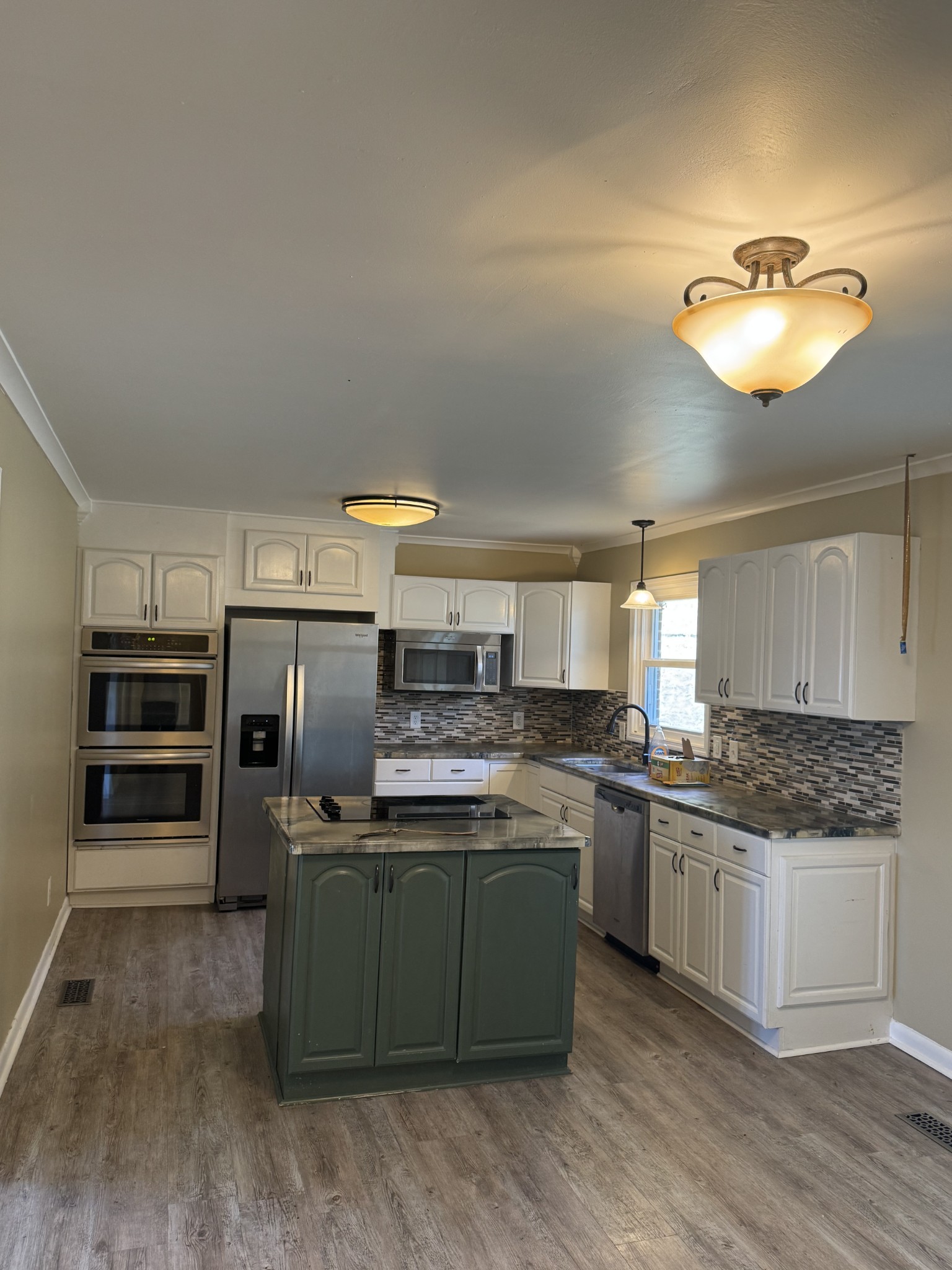 36 Hartsville Pike Carthage, TN 37030 - Photo 15 of 28 a kitchen with cabinets and stainless steel appliances