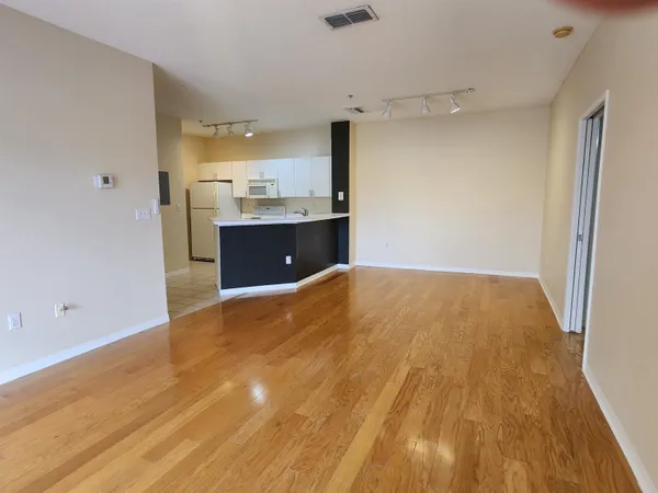 a view of a kitchen cabinets a sink and dishwasher