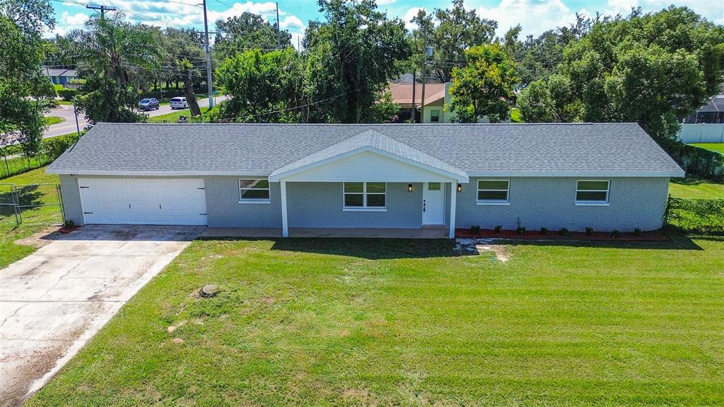 2015 Capri Road Valrico, FL 33594 - Photo 2 of 34 a house with a yard