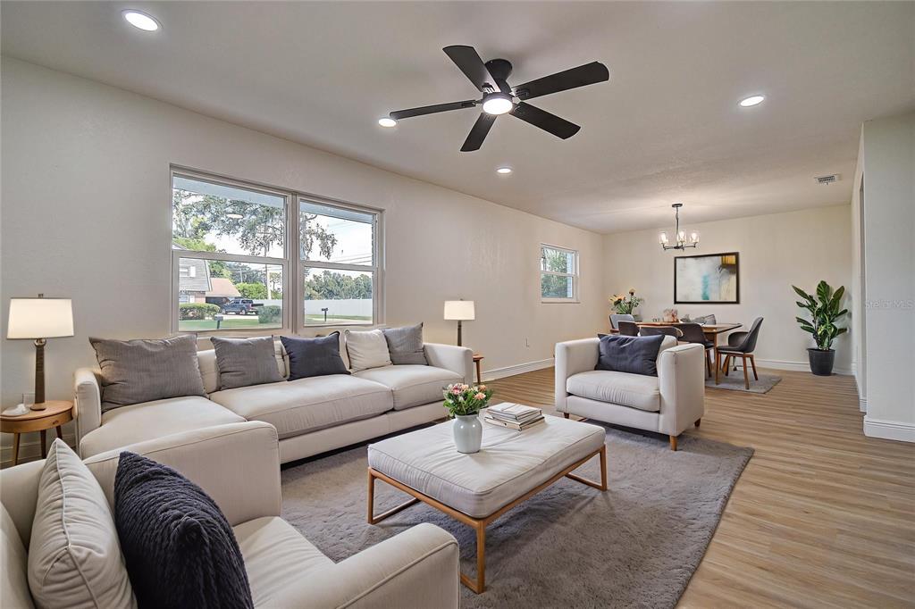 2015 Capri Road Valrico, FL 33594 - Photo 21 of 34 a living room with furniture