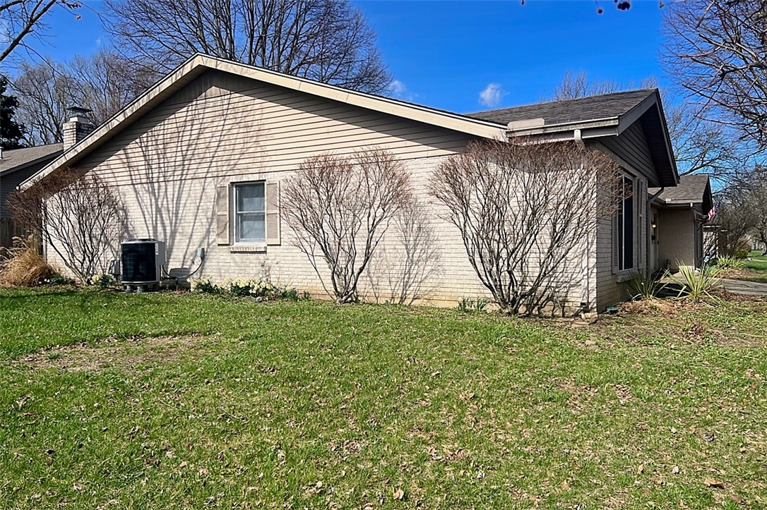 920 North Dorset Road, Unit 920 Troy, OH 45373 - Photo 16 of 18 This charming home features a classic exterior and a well-maintained yard.
