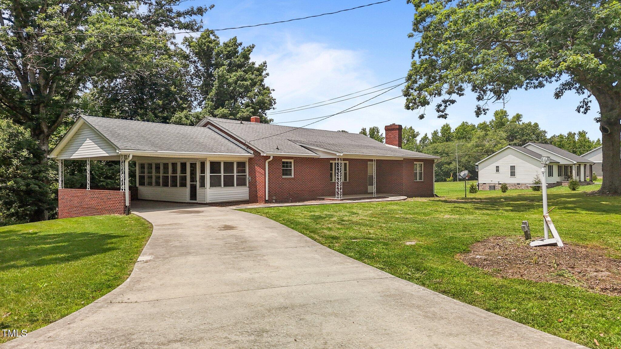 2291 Gentry Ridge Road Roxboro, NC 27574 - Photo 2 of 19 36-web-or-mls-DJI_20250604135646_0339_D