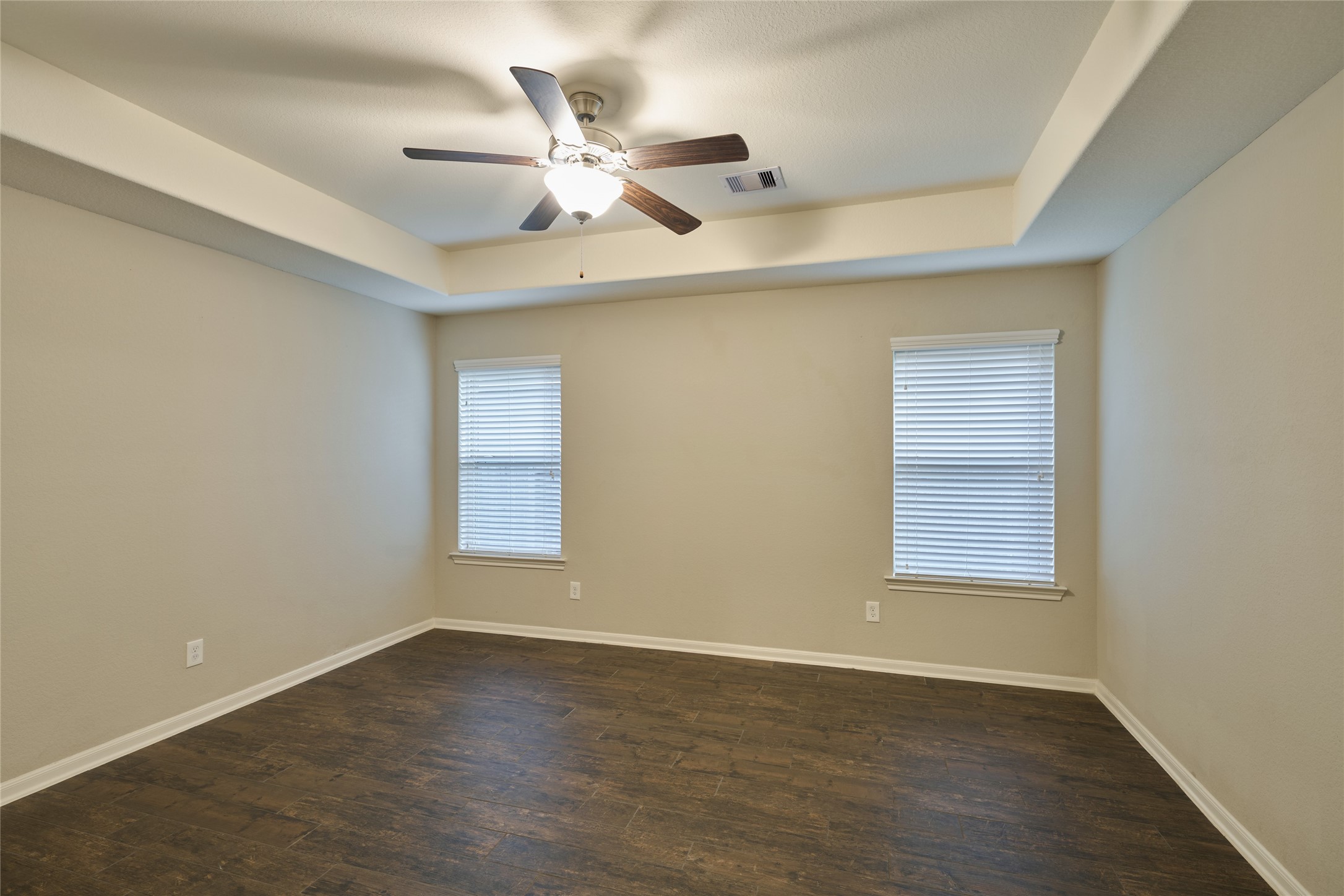 116 Fox Trail Road Montgomery, TX 77316 - Photo 25 of 50 The primary bedroom has lot of light and tile flooring.