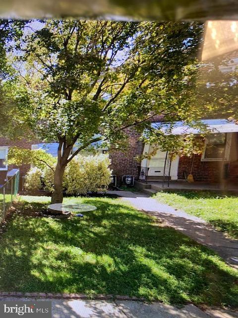 128 Margate Road Upper Darby, PA 19082 - Photo 12 of 12 a backyard of a house with lots of green space