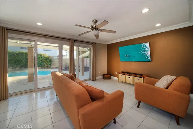 a outdoor living space with furniture and a floor to ceiling window