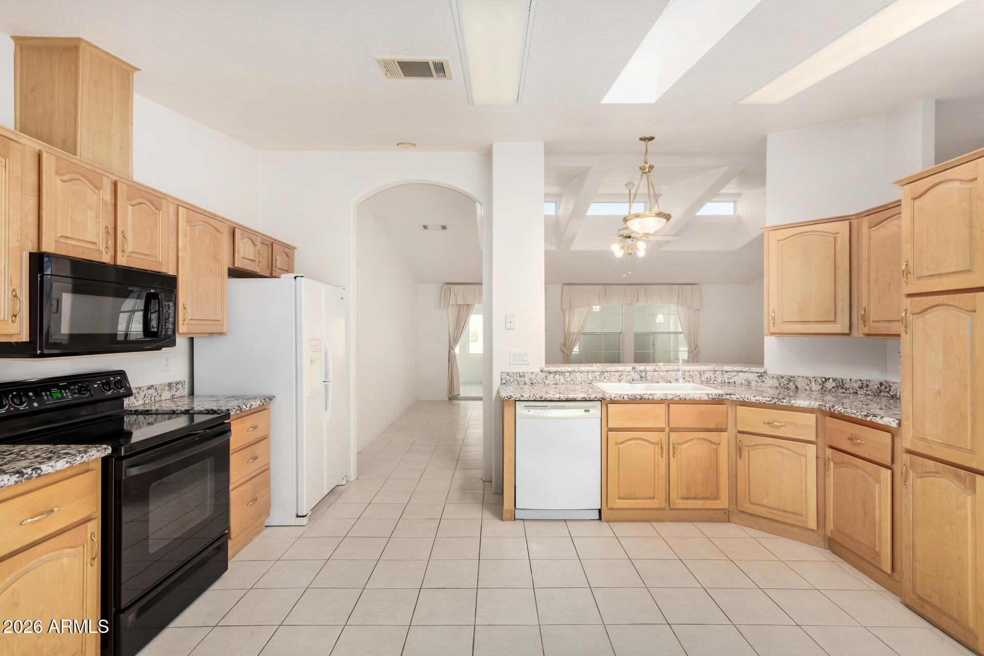 3301 South Goldfield Road, Unit 3004 Apache Junction, AZ 85119 - Photo 11 of 67 a large kitchen with cabinets