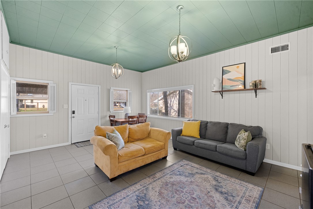 909 Enfield Street Bryan, TX 77802 - Photo 28 of 45 Living room attached to the primary bedroom. Could be used as additional living quarters.