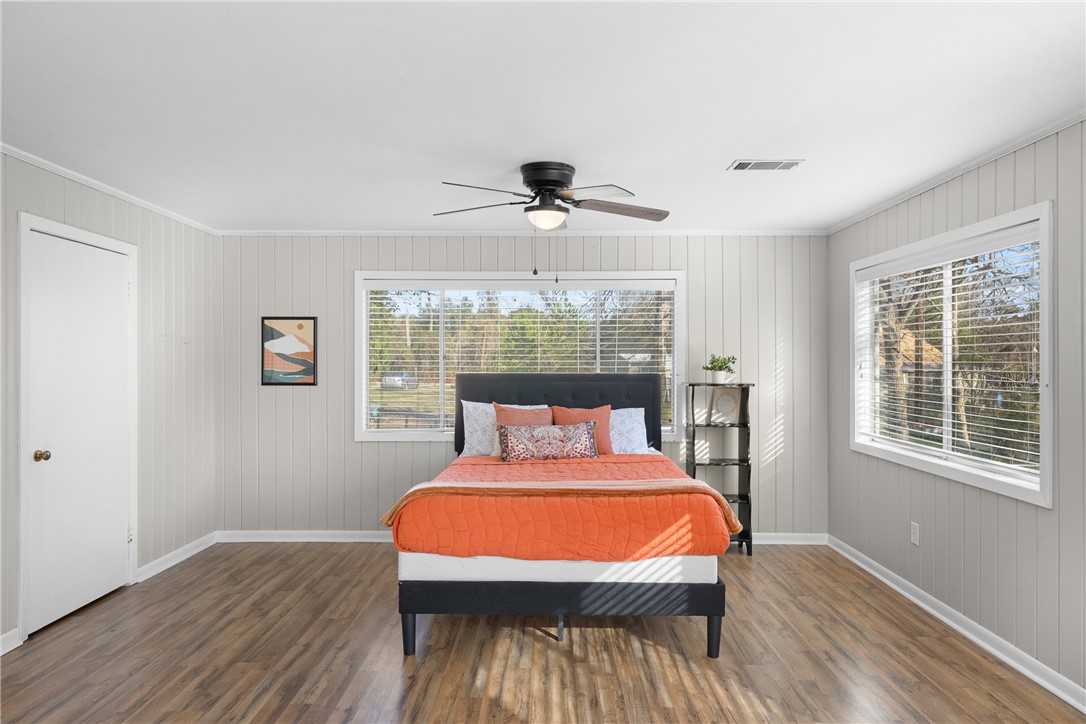 909 Enfield Street Bryan, TX 77802 - Photo 33 of 45 Extra large primary bedroom with lots of natural light.