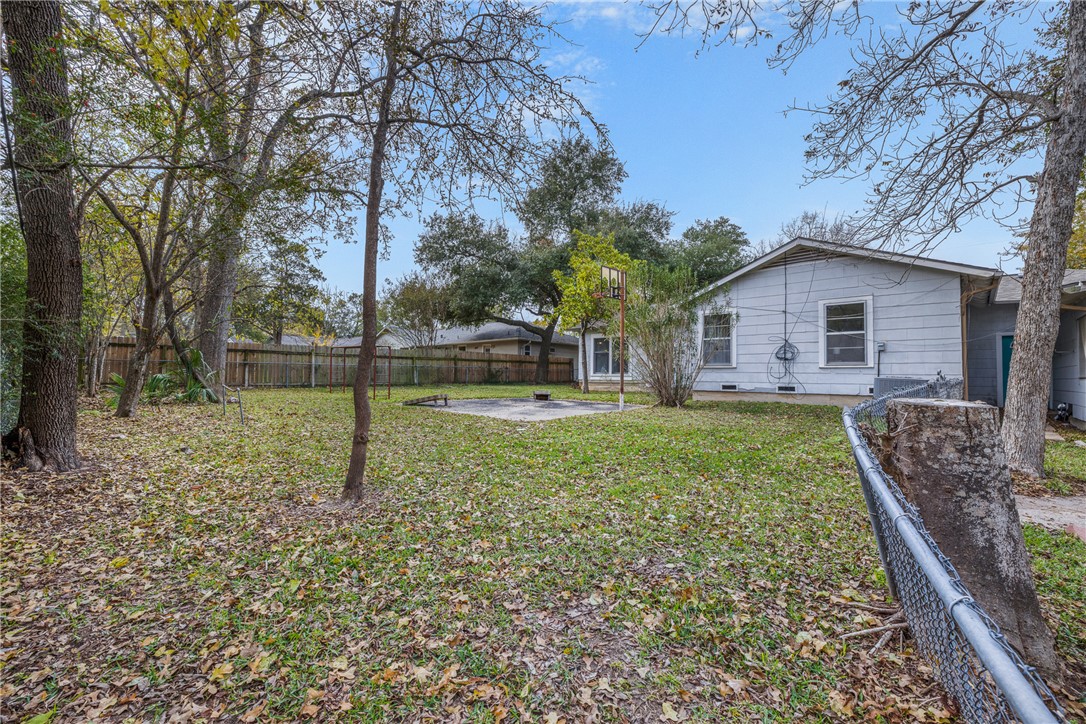 909 Enfield Street Bryan, TX 77802 - Photo 37 of 45 Fenced backyard with a patio area