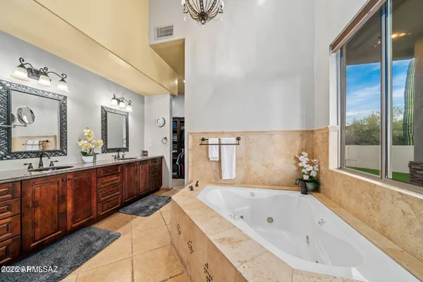 a bathroom with a toilet sink and shower