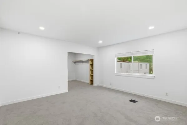 an empty room with window