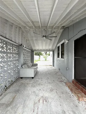 a view of a room with windows