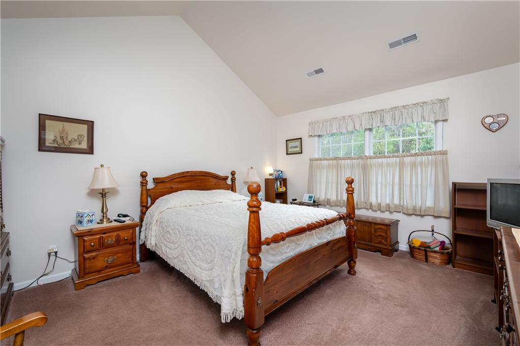 192 Wood Hawk Lane Butler, PA 16001 - Photo 14 of 23 a bedroom with a bed and a window