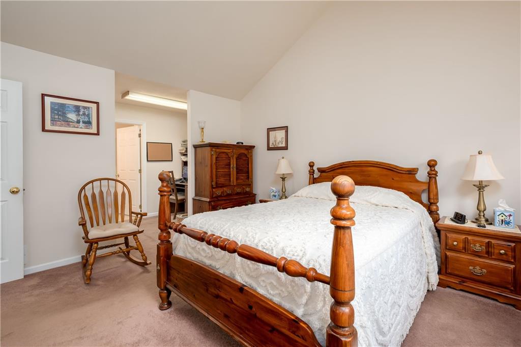 192 Wood Hawk Lane Butler, PA 16001 - Photo 15 of 23 a bedroom with a bed and wooden floor