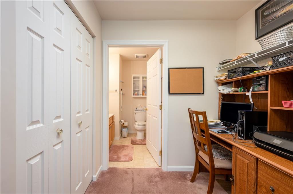 192 Wood Hawk Lane Butler, PA 16001 - Photo 16 of 23 a view of a workspace with furniture and a window