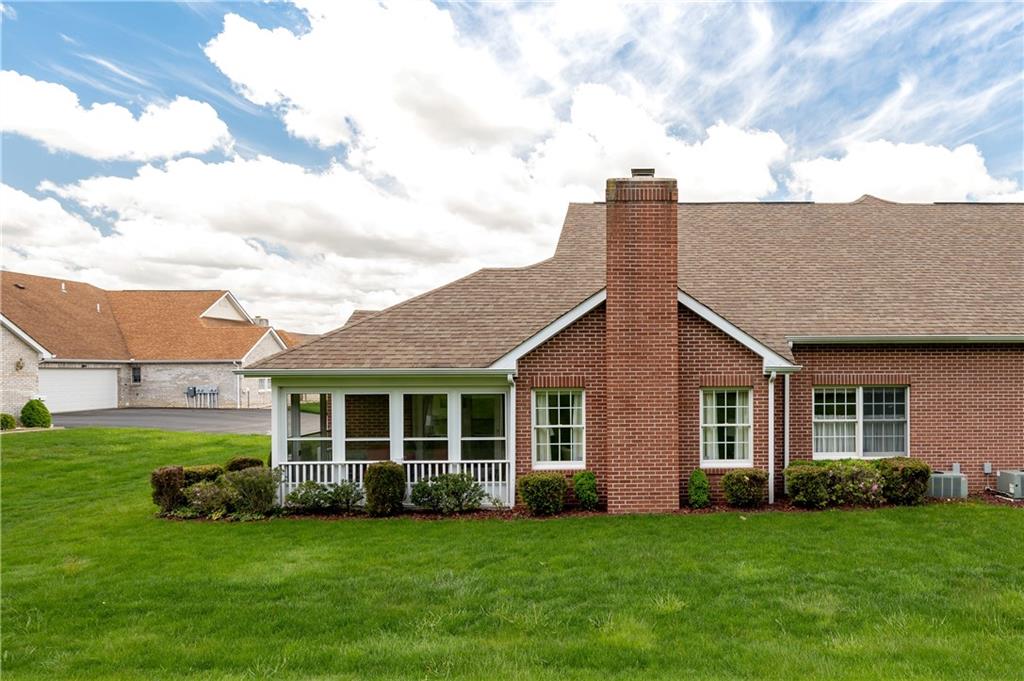 192 Wood Hawk Lane Butler, PA 16001 - Photo 22 of 23 a view of a house with a backyard