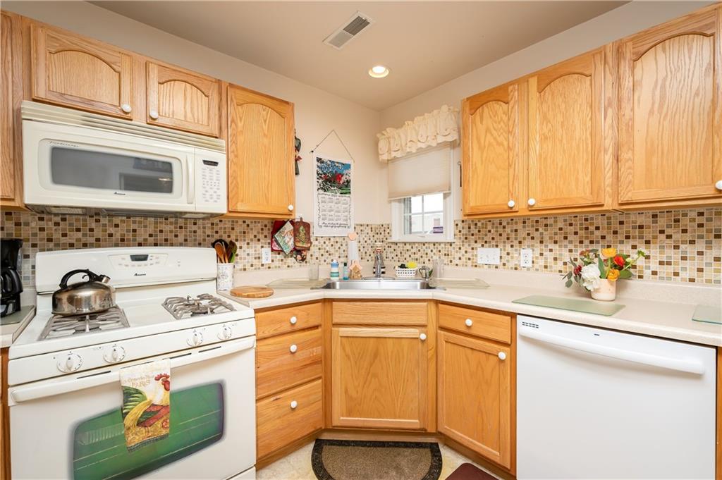 192 Wood Hawk Lane Butler, PA 16001 - Photo 8 of 23 a kitchen with appliances cabinets and a sink