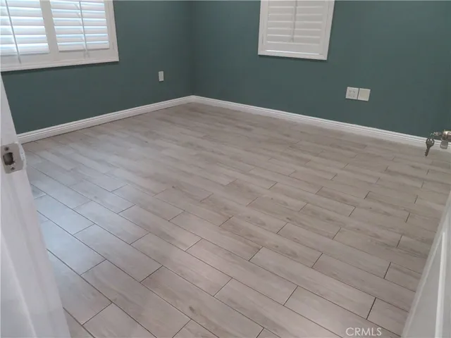 a view of livingroom with furniture and window