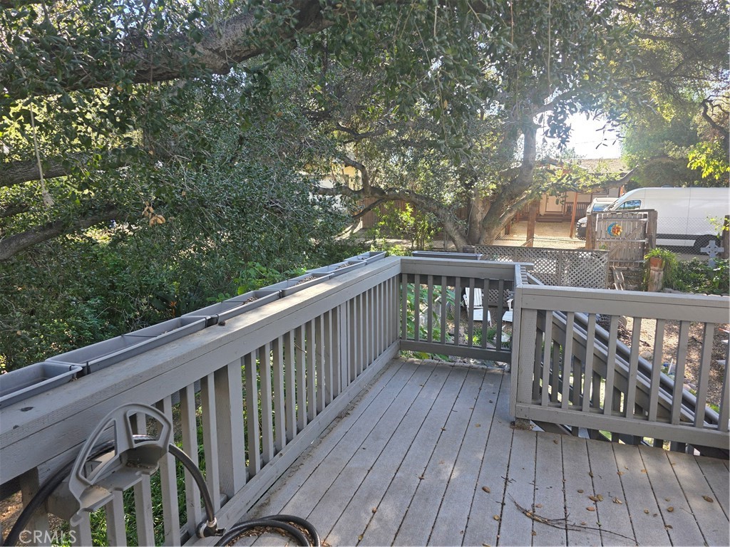 9341 Rollins Road Chatsworth, CA 91311 - Photo 12 of 15 a view of deck with wooden floor and outdoor seating