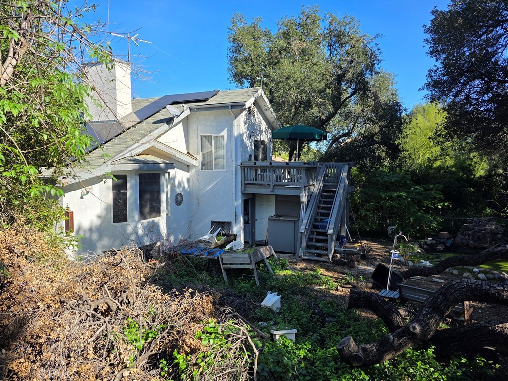 9341 Rollins Road Chatsworth, CA 91311 - Photo 15 of 15 a front view of a house with garden