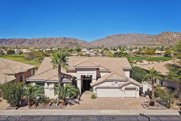 an aerial view of a house with a garden