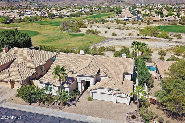 a view of a city with mountains in the background