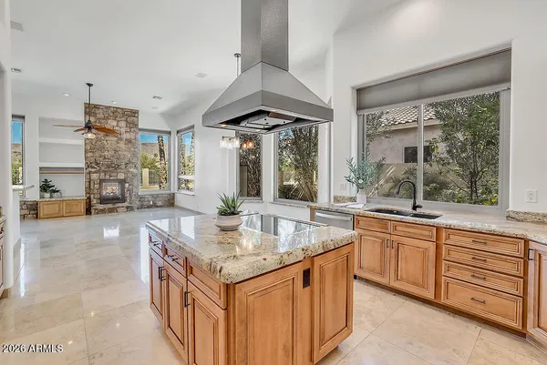 a kitchen with a stove and a sink