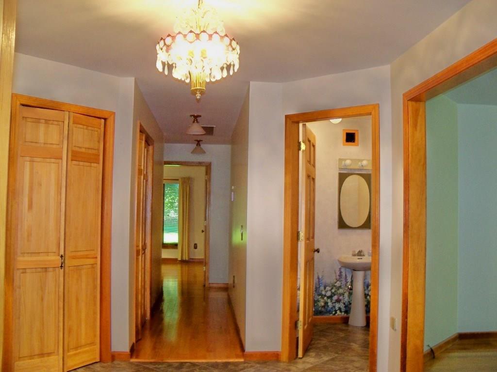 842 North River Road Greene, ME 04236 - Photo 5 of 24 ENTRY, HALF BATH AND HALLWAY