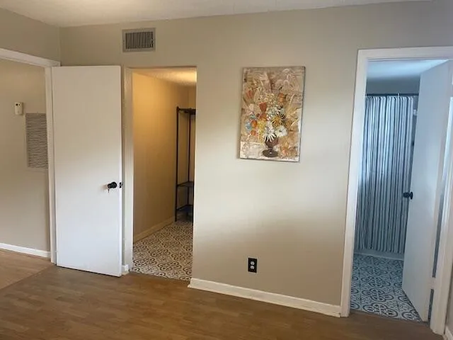 a bathroom with a toilet a sink a bath tub and shower