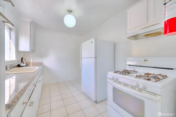 a bathroom with a bathtub and a sink