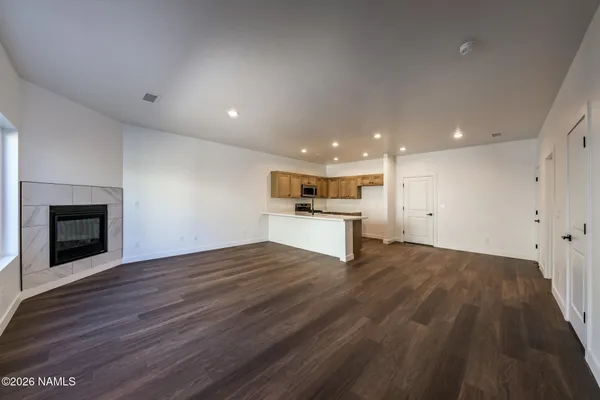 a kitchen with a sink and natural light