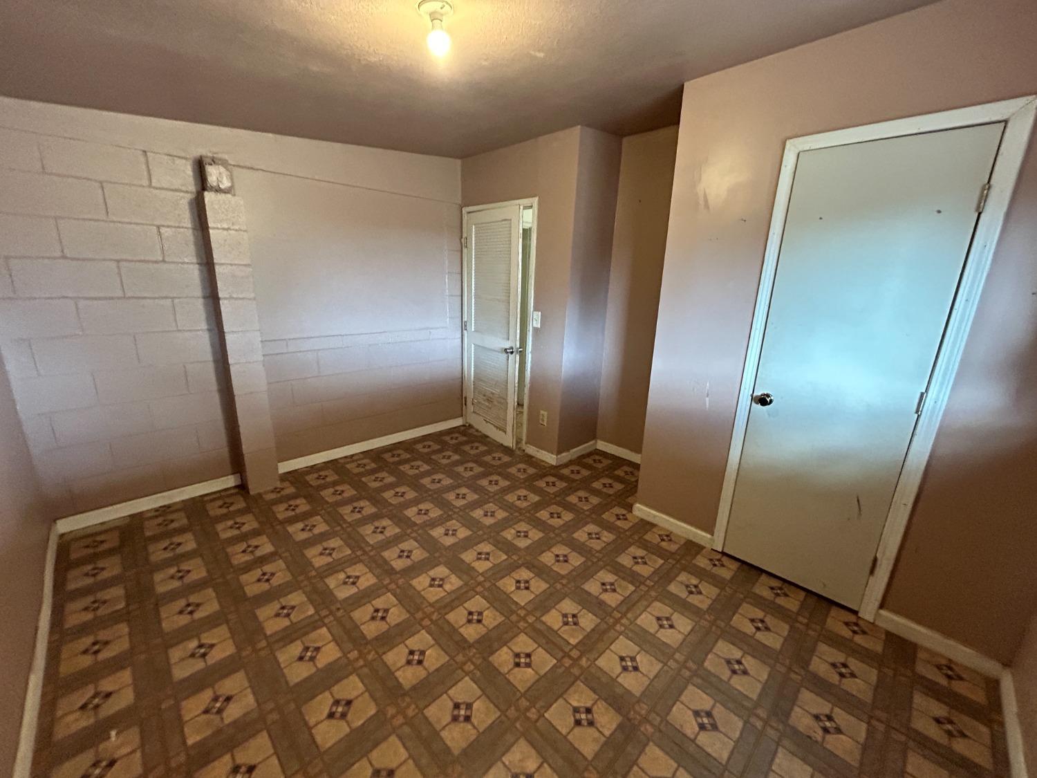 236 K Street Sanger, CA 93657 - Photo 14 of 23 a bathroom with a sink and a mirror